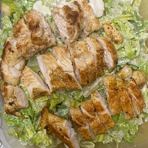 Peppajak's Caesar salad with grilled chicken, croutons, and creamy dressing.