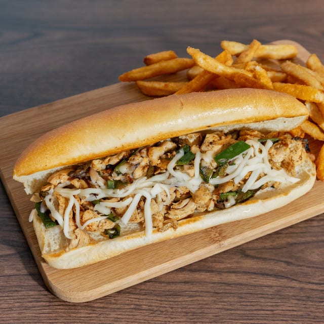 Chicken Philly sub with fries.