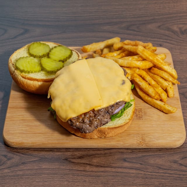 Classic crave cheeseburger with fries.